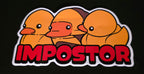 Sticker with three rubber ducks and the word 'Impostor' on a black background
