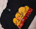 A picture of a tshirt with two rubber ducks and a rubber ducky isopod in the middle with the word impostor 
